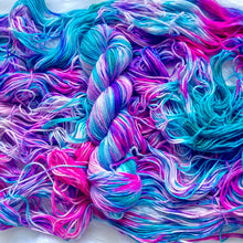 Load image into Gallery viewer, Colorful yarn skeins in pink, blue, and purple on a white background